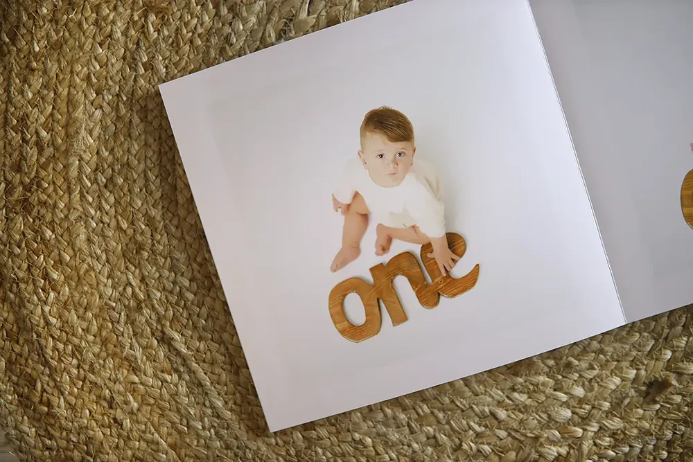 An image shows a child's photo on our product layflat page, which looks highly realistic.